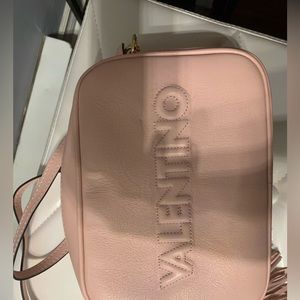 Valentino in mint condition.